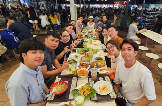 Group photo of journalists and SIF team at Newton Food Centre